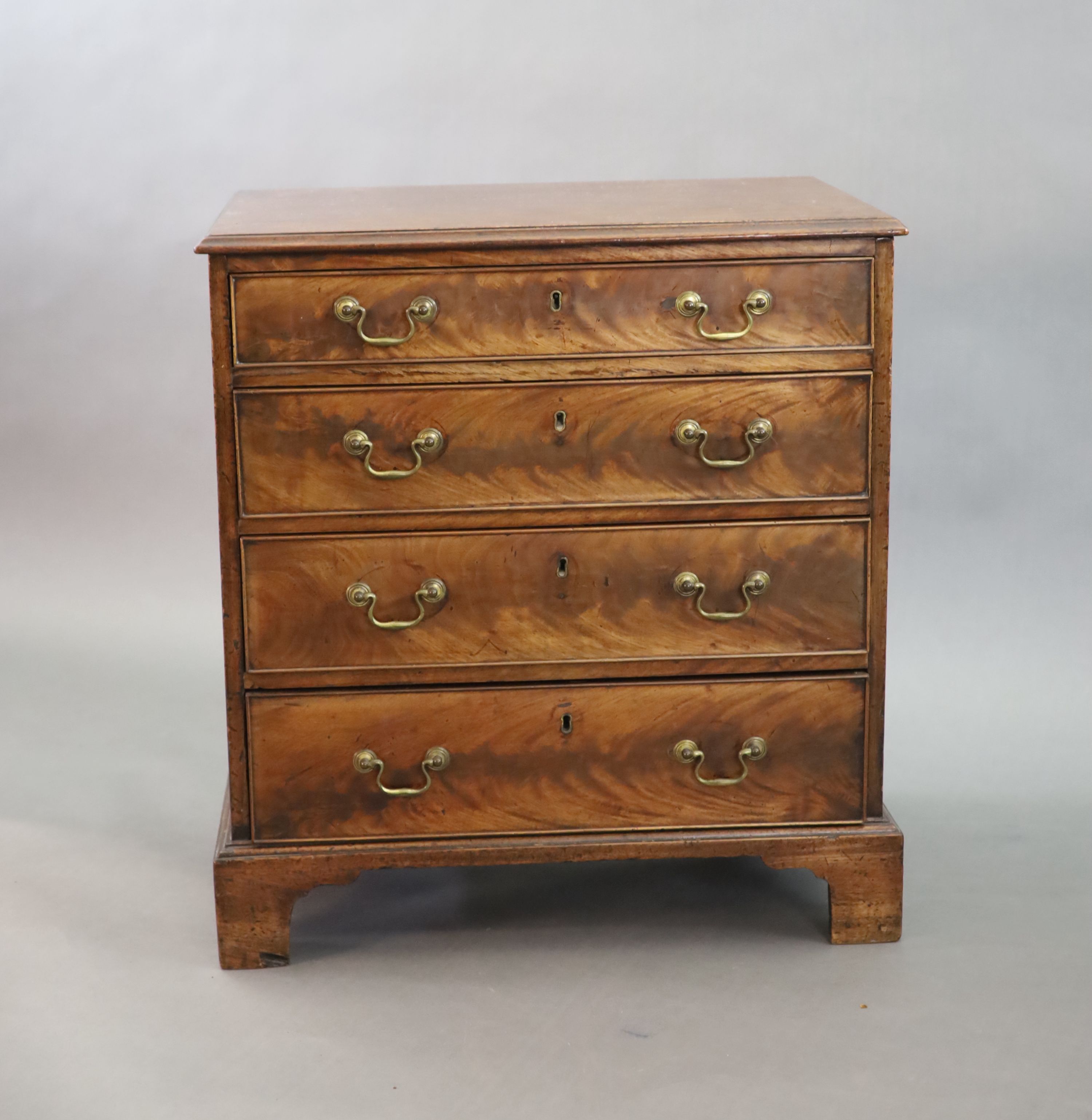 An unusually small George III mahogany chest of drawers, W.68cm D.45cm H.74cm